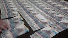 14 цехов по изготовлению фальшивых денег нашел финпол Казахстана